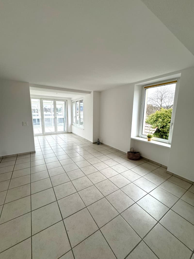 empty room, white tiled floor, glass doors, windows, basket on window sill