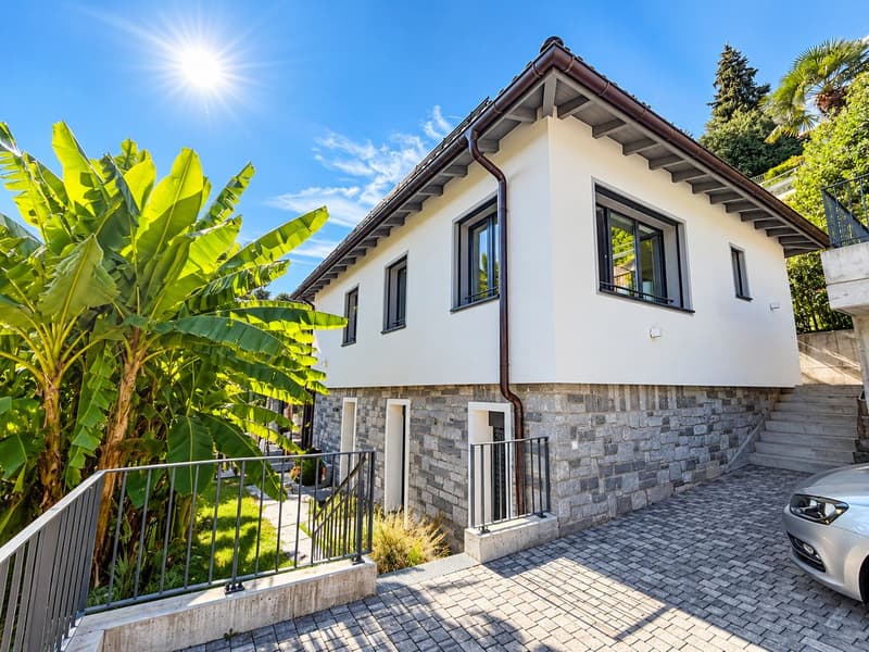 Porza - Elegante appartamento 3.5 locali con vista lago, terrazzo e giardino privato (1)