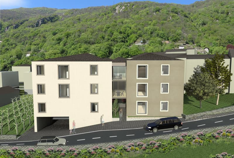 3-story apartment building with beige exterior, large windows, and a parking area in front. The building is situated on a hillside with lush green vegetation surrounding it.