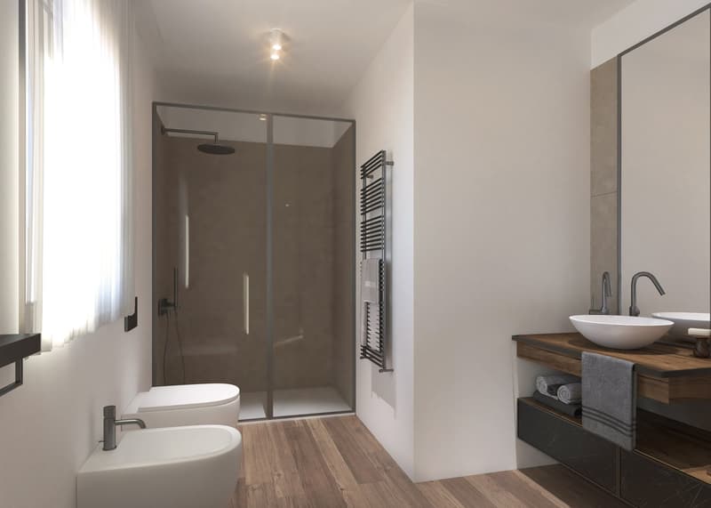 Modern bathroom with glass shower enclosure, white toilet, vessel sink, wooden vanity, and towel rack
