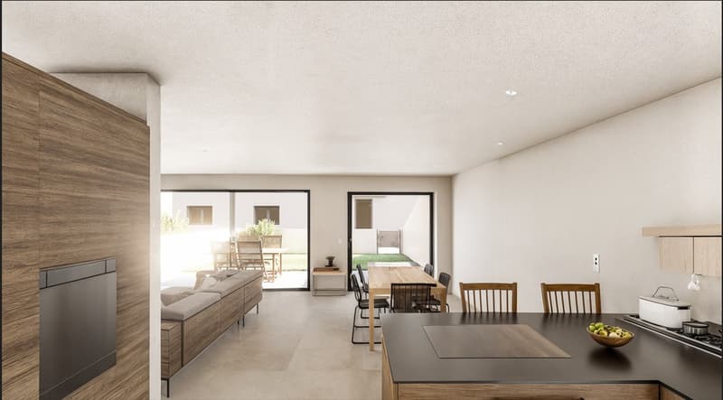 Open-concept living room and kitchen with large windows, wooden wall panels, gray sofa, dining table and chairs, kitchen counter with appliances, and access to a balcony or terrace.