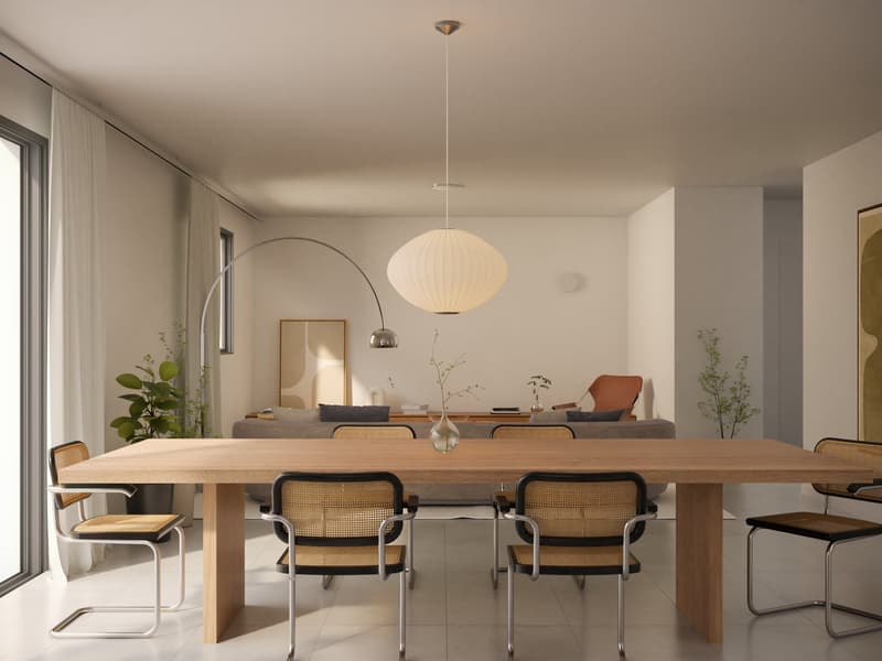 Dining room with wooden table, chairs, pendant lamp, couch, plants, and a window