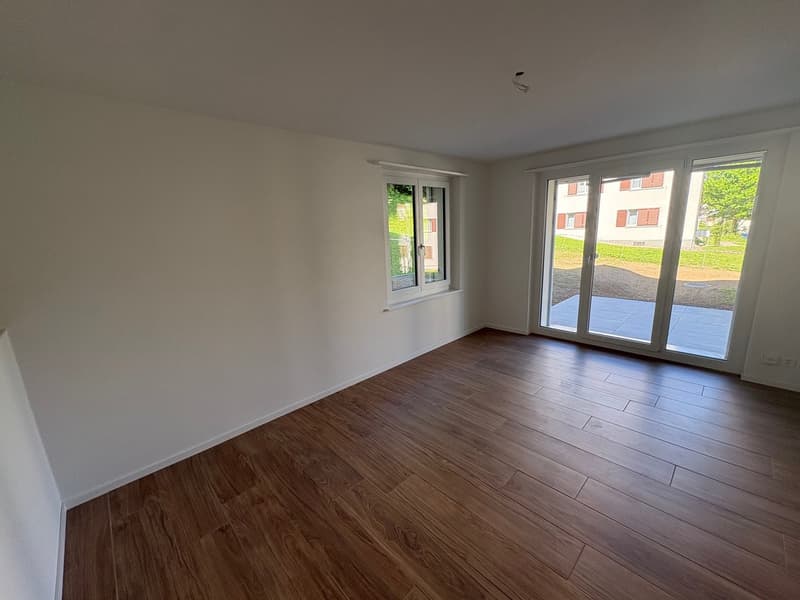 Prima locazione di un appartamento moderno di 2.5 locali con posto giardino privato (4)
