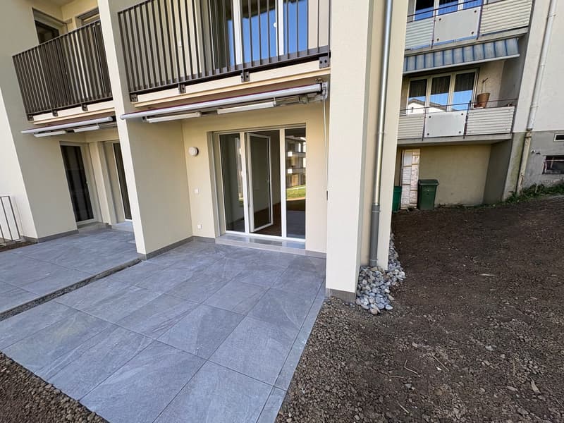 Prima locazione di un appartamento moderno di 2.5 locali con posto giardino privato (8)