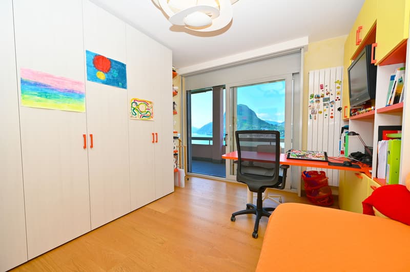 Appartamento con Terrazza e Vista Mozzafiato sul Lago di Lugano (13)