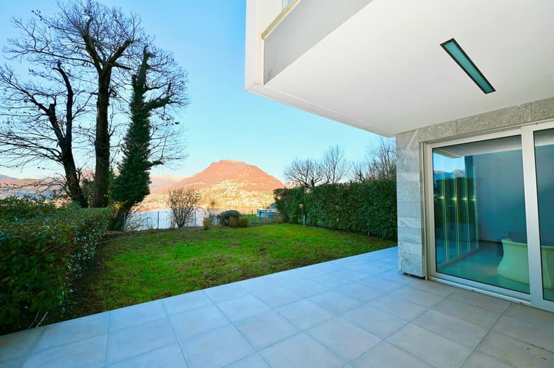 Moderno Appartamento con Giardino: Design, Tecnologia e Vista Lago (7)