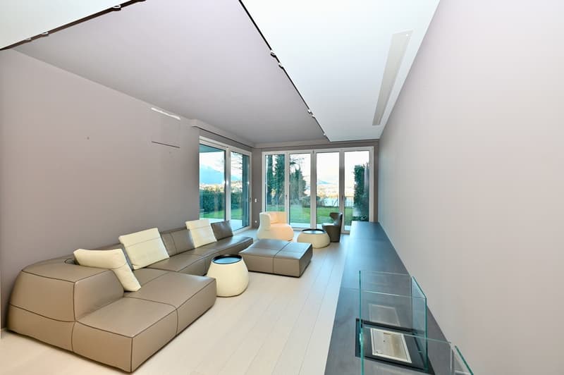 Moderno Appartamento con Giardino: Design, Tecnologia e Vista Lago (5)