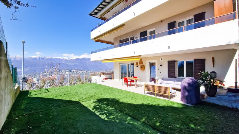 Raffinato Appartamento con Giardino e Vista sul Golfo di Lugano (4)