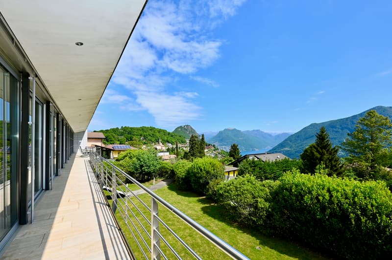 Elegant Modern Villa Surrounded by Greenery with Panoramic View of Lake Lugano (10)