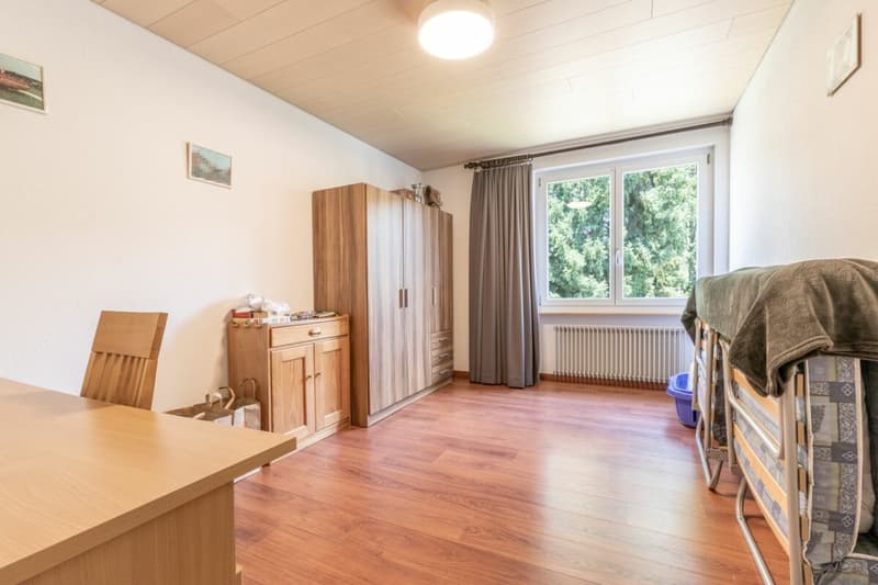 Appartamento confortevole di 3,5 locali con balcone e due posti auto sotterranei (11)