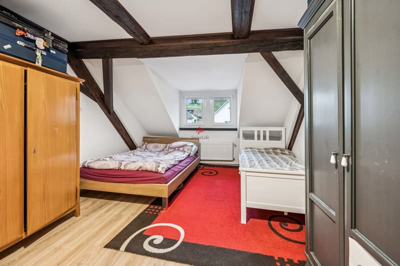 Casa multifamiliare attraente con redditi locativi stabili (8)