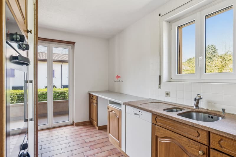 / Cuisine de l'appartement du rez-de-chaussée
