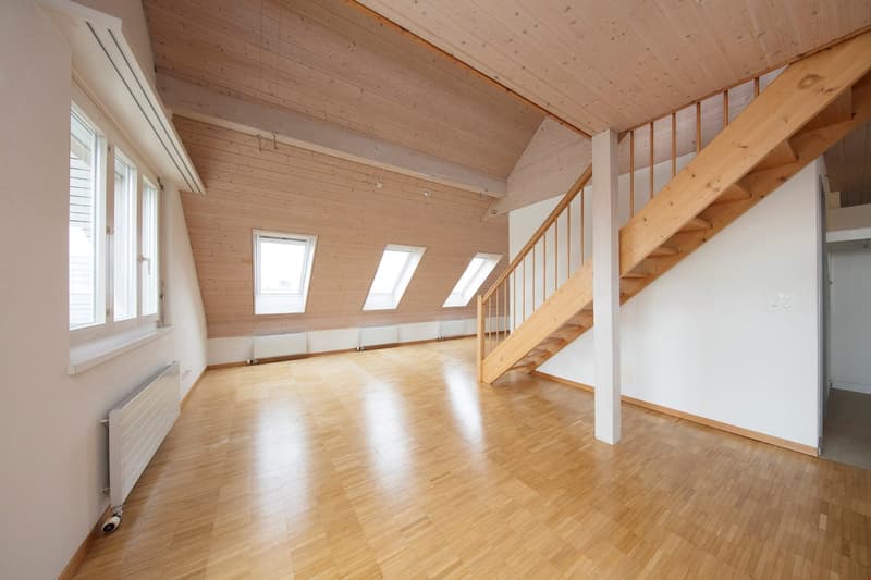 empty room, wooden floor, wooden ceiling, wooden stairs, windows, radiator