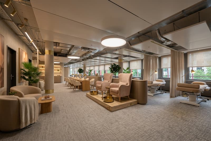 Modern open space with furniture and chairs for beauty treatments.