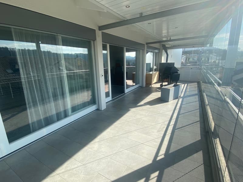 Glass doors, tiled floor, glass walls, view, outdoor furniture