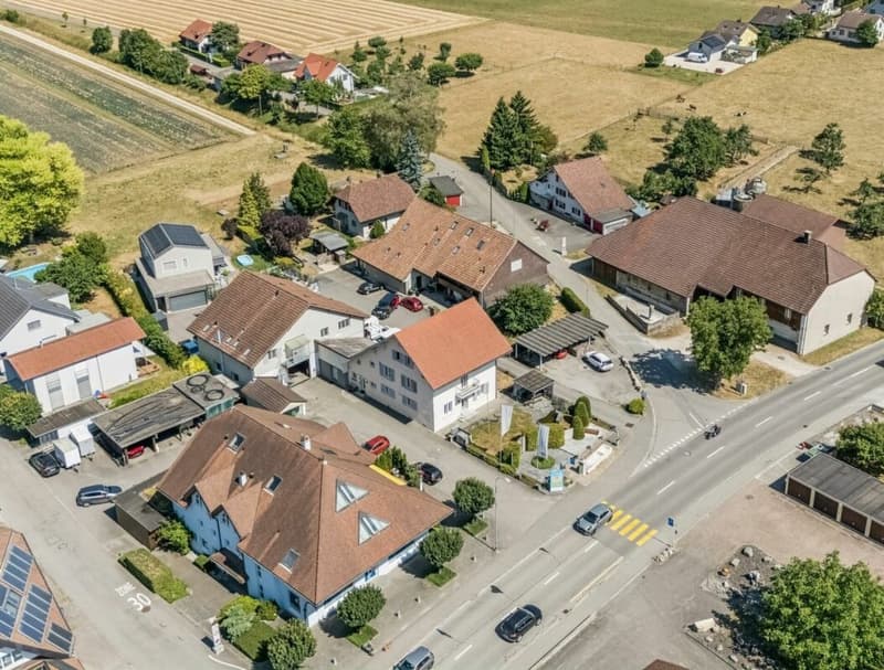 Mehrfamilienhaus mit Gewerberäumen, Garagen - Vielseitiges Renditeobjekt mit Entwicklungspotential. (2)