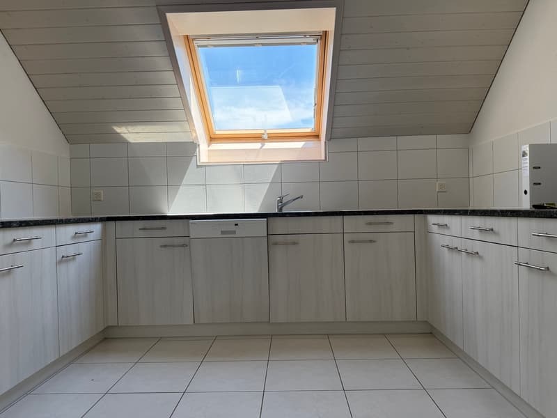 Charming 3.5-room attic apartment with fireplace and balcony (9)