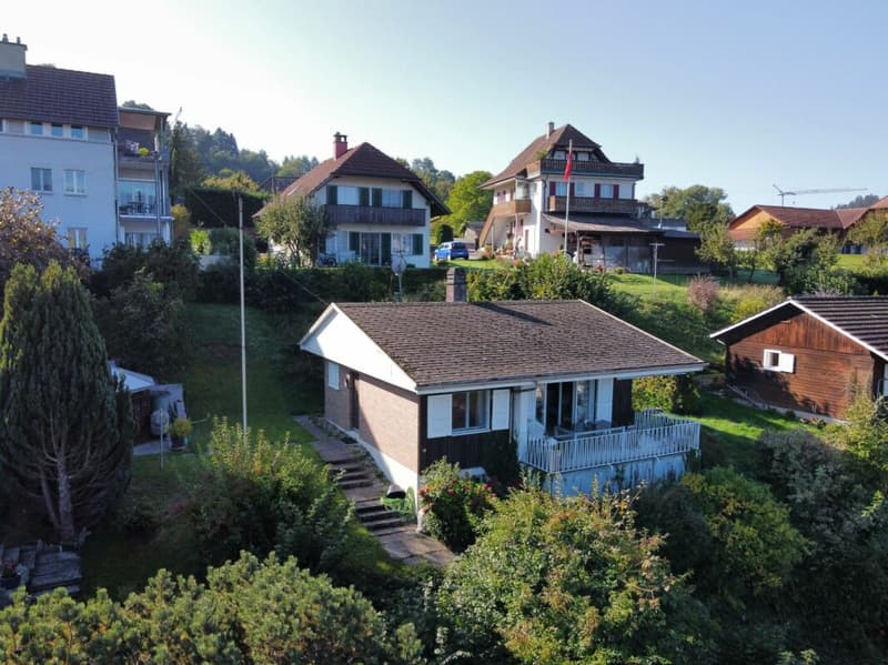 Terreno con vista diretta sul lago e potenziale di costruzione (2)