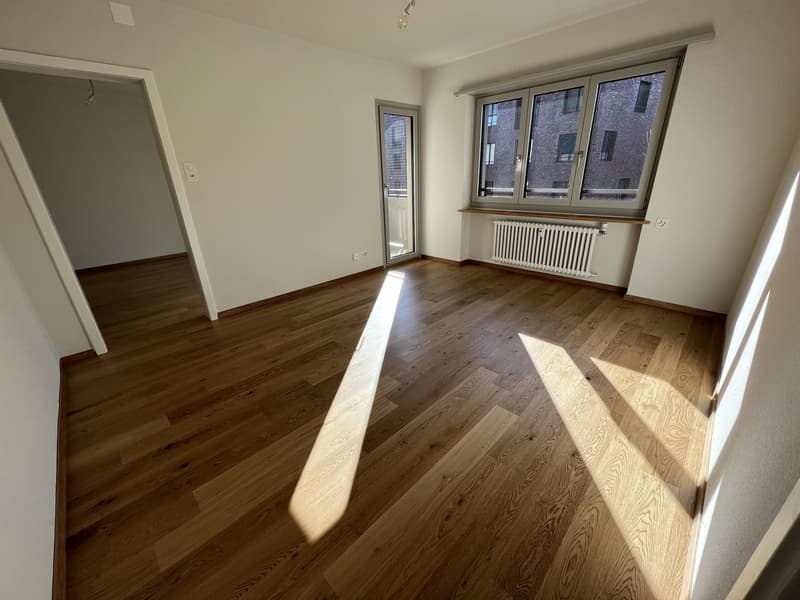 Wohnzimmer (Beispielfoto aus baugleicher Wohnung auf dem 2.OG; Abweichungen sind möglich)