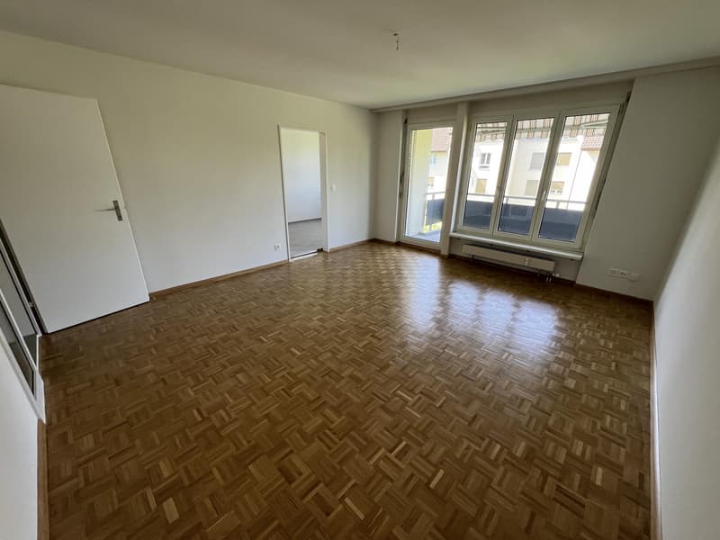 Wohnzimmer (Beispielfoto aus baugleicher Wohnung im 1.OG; Abweichungen sind möglich)