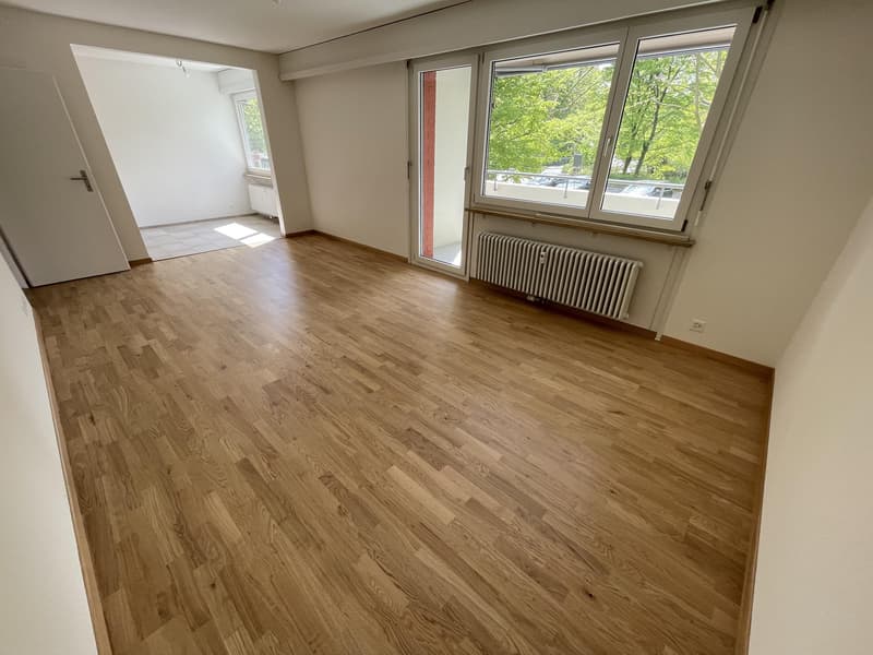 Wohnzimmer (Beispielfoto aus baugleicher Wohnung im 1.OG; Abweichungen sind möglich)