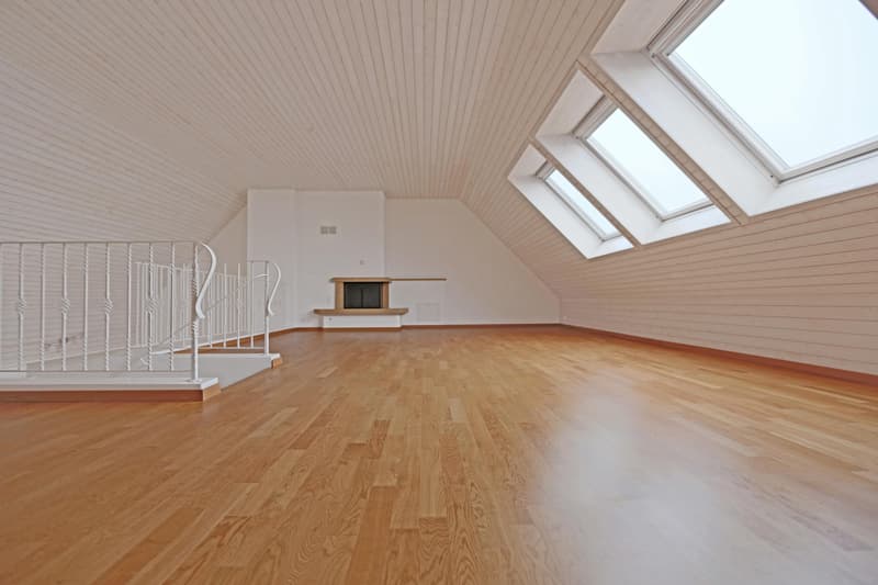Galeriezimmer mit Cheminée