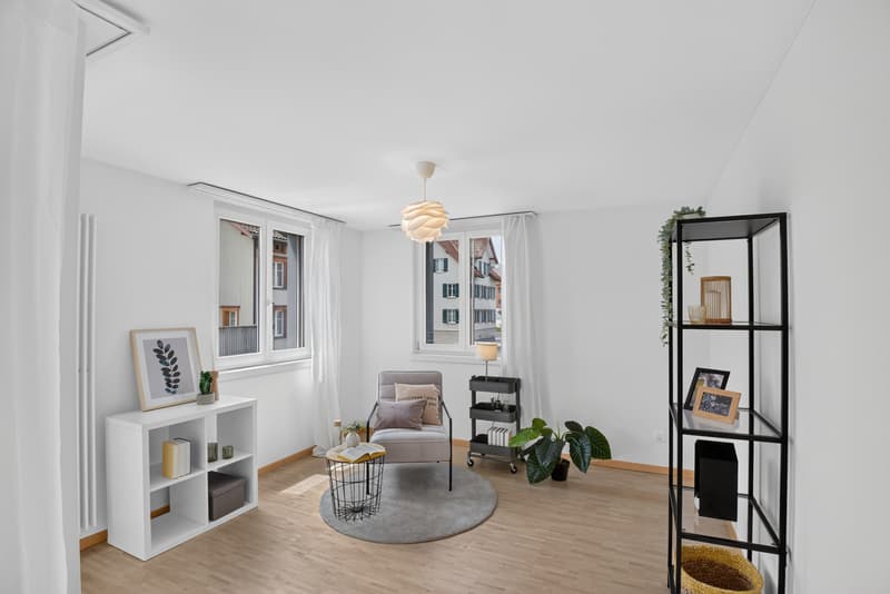 ESCLUSIVO CONDOMINIO DI 4,5 LOCALI CON BALCONE E AMPIO SENSO DELLO SPAZIO (2)