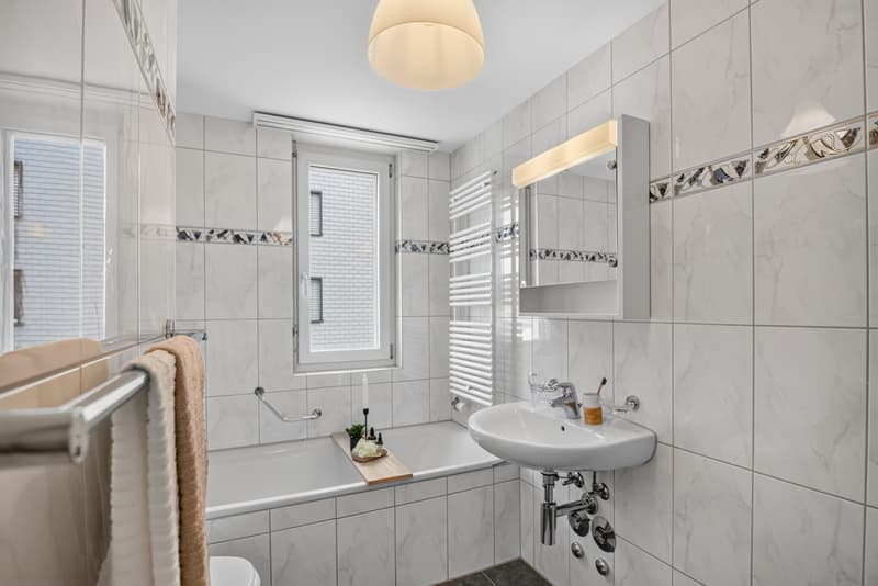 ESCLUSIVO CONDOMINIO DI 4,5 LOCALI CON BALCONE E AMPIO SENSO DELLO SPAZIO (6)