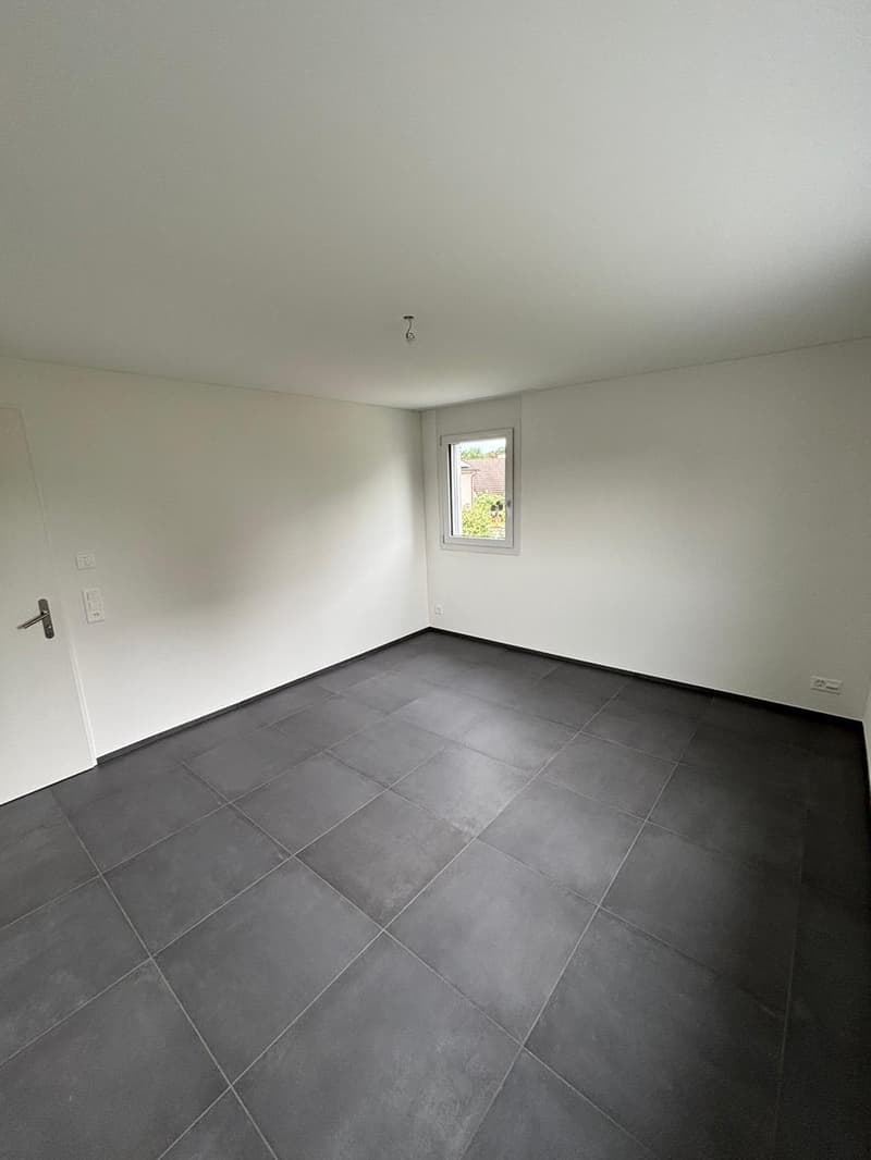 Appartement moderne de 2,5 pièces avec grand balcon et parking souterrain à Bülach (9)