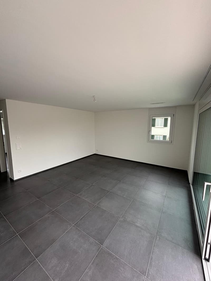 Appartement moderne de 2,5 pièces avec grand balcon et parking souterrain à Bülach (3)