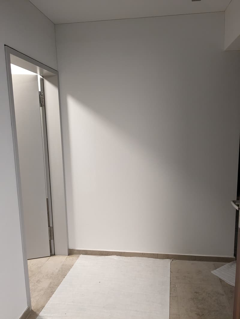 Entrance - bathroom on the left, living room on the right