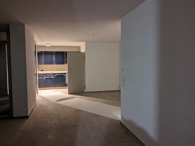 Living room towards kitchen