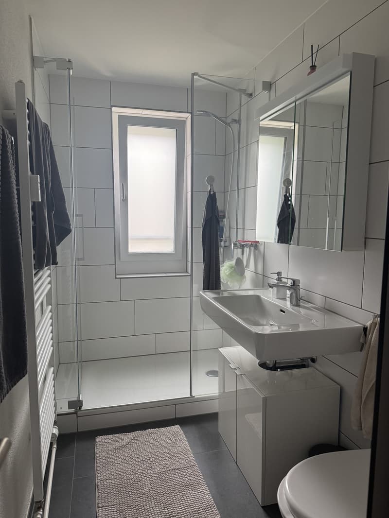Bathroom with washer and dryer