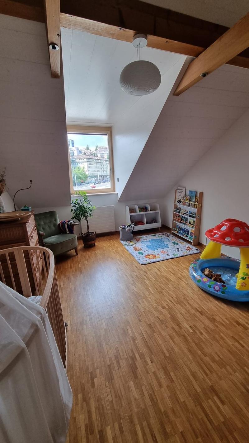 Bright 2.5-room attic apartment with terrace in the heart of Lausanne (1)