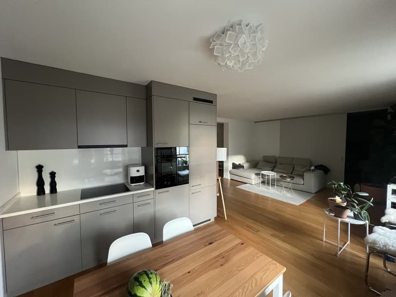 Living room with open kitchen