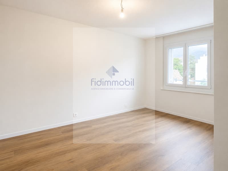 Ampio appartamento di 4 locali con balcone e posto auto (6)