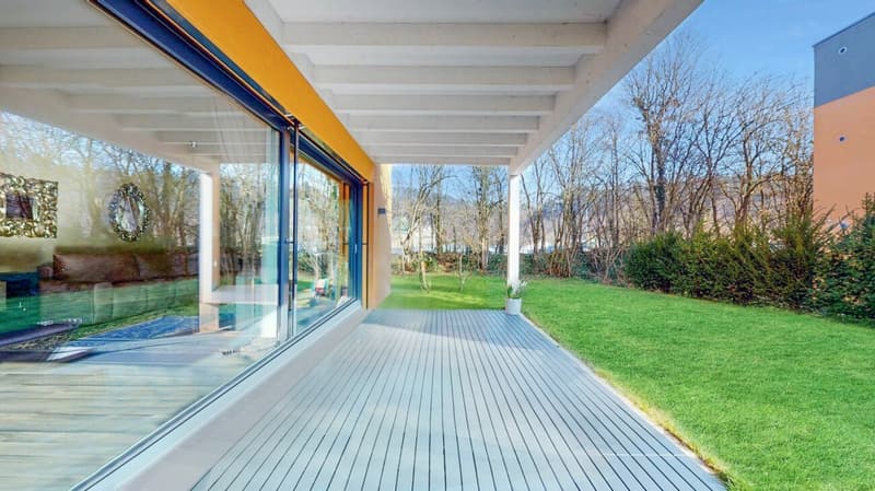 Appartement de jardin 4,5 pièces élégant avec garage et place de parking extérieure (1)