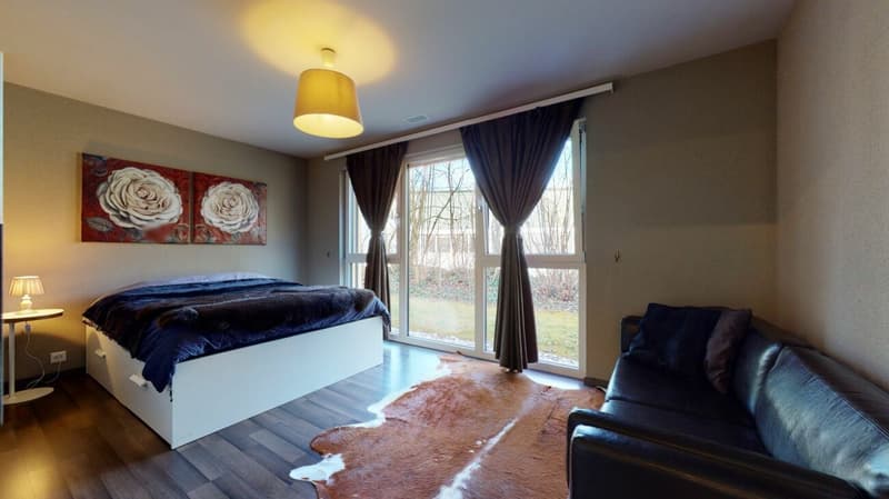 Appartement de jardin 4,5 pièces élégant avec garage et place de parking extérieure (8)