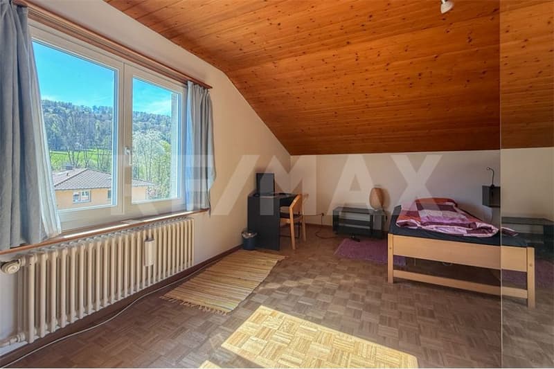 Single-family house on the sunny slope with a spacious plot in Obermumpf for sale. (7)