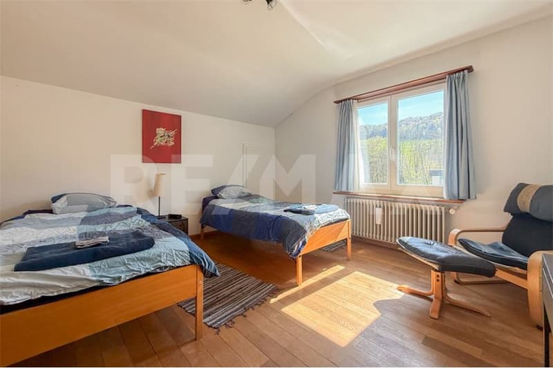 Single-family house on the sunny slope with a spacious plot in Obermumpf for sale. (6)
