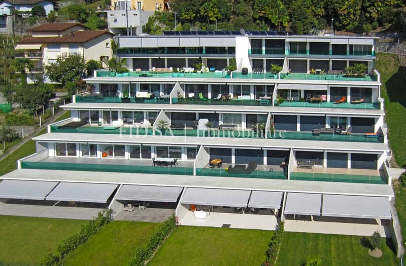 SOLDUNO - Stilvolles Wohnen mit grosser Terrasse und Sicht ins Grüne (11)