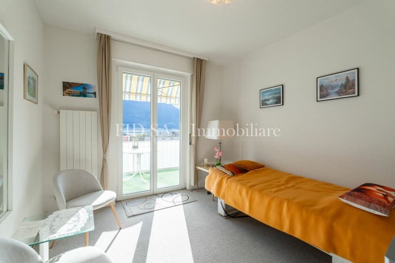 BRISSAGO - Ampio appartamento in posizione centrale e soleggiata con vista aperta sul lago (7)