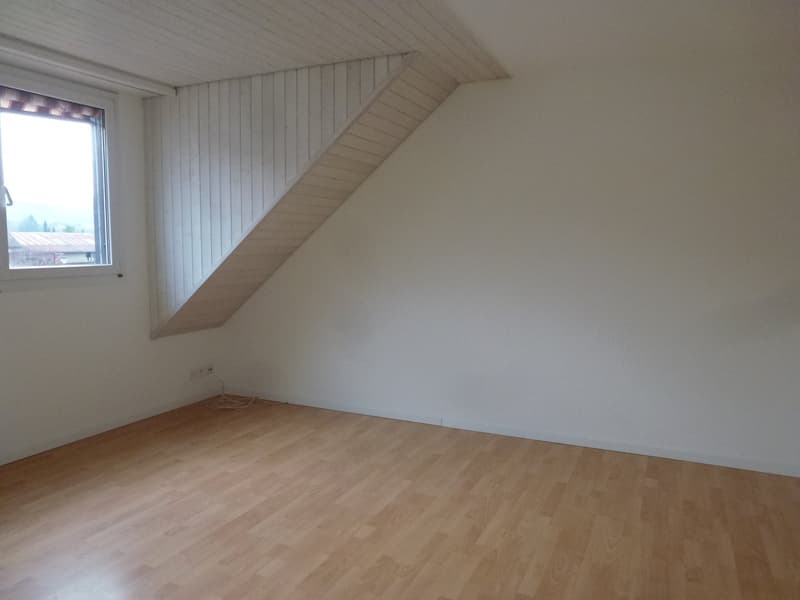 empty room, white walls, wooden floor, window, power outlet