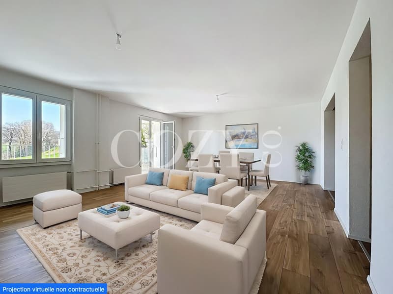Spacious open-plan living room with large windows, hardwood flooring, beige sofa set, coffee table, and dining area with table and chairs. The room has a bright and airy feel with natural light and potted plants.