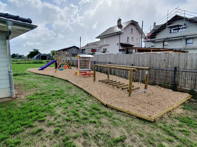 children's playground, playhouse, wooden fence, wooden slide, wooden swing, climbing wall