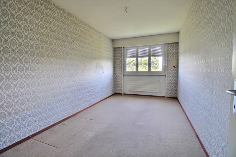 Spacieux appartement familial avec beau potentiel (9)