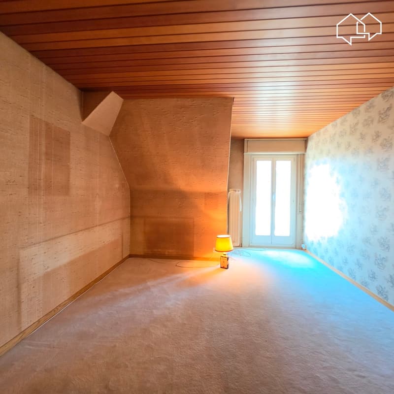 Combles: chambre 1 donnant sur le balcon