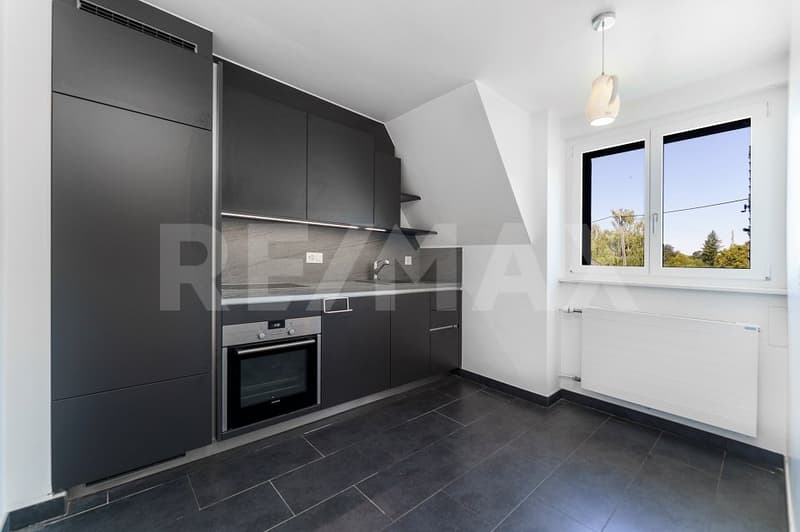 Lumineux appartement de 2,5 pièces avec balcon et vue sur le lac (5)