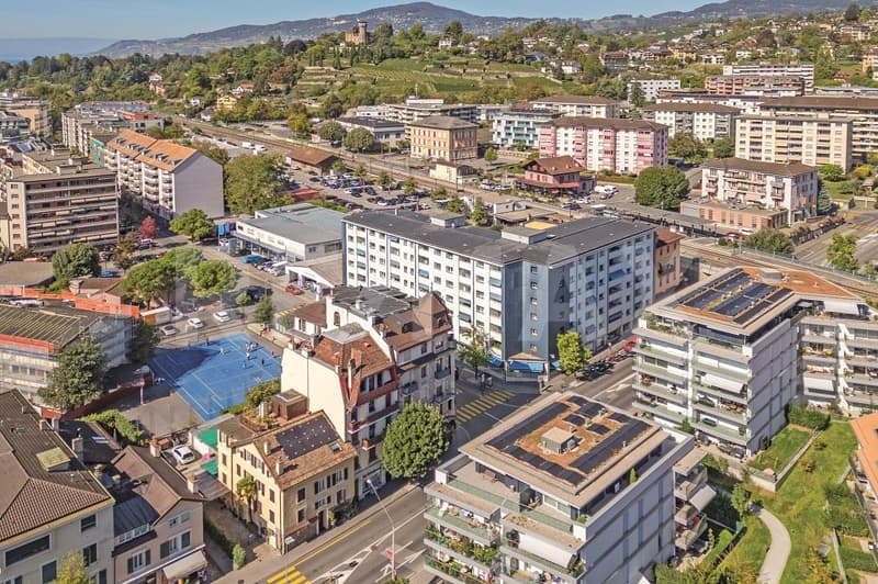 Immeuble de rendement : 2 surfaces commerciales et 4 appartements 3.5 pièces (3)