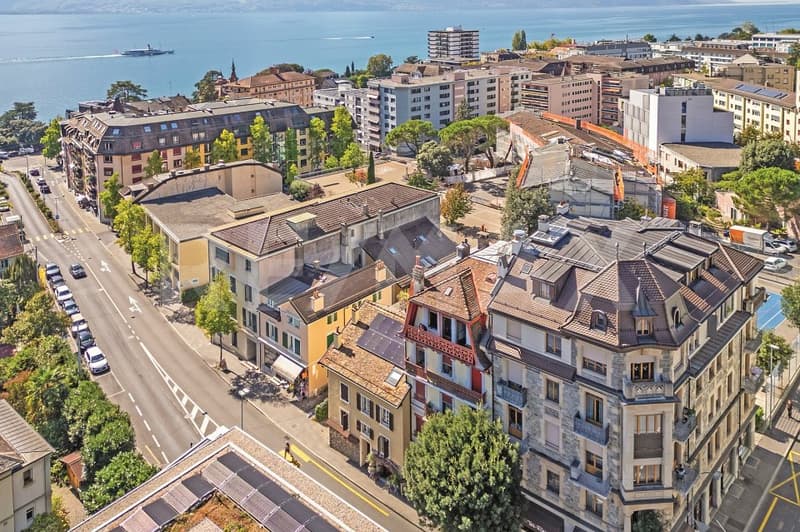 Immeuble de rendement : 2 surfaces commerciales et 4 appartements 3.5 pièces (4)
